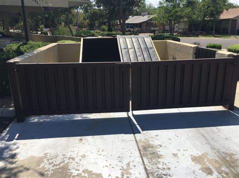 metal deck for trash enclosure|dumpster gate deck.